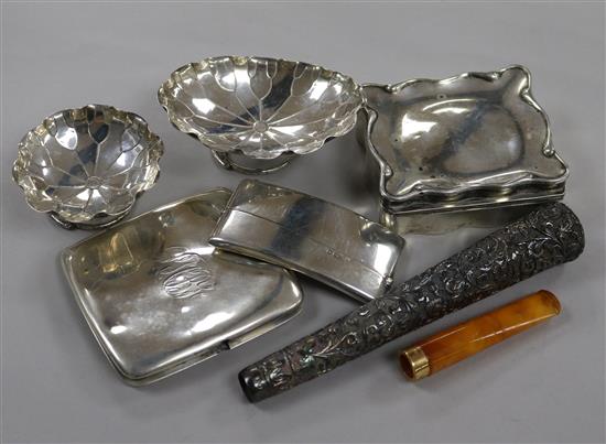 An Edwardian silver trinket box, a silver card case, silver cigarette case, two Chinese dishes, a cane handle and cigarette holder.